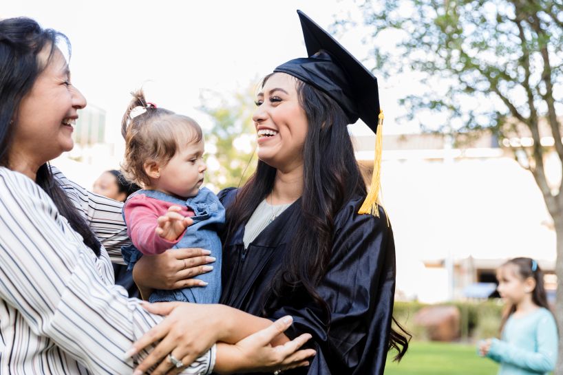 Grandmother, mother and daughter all embrace after second-chance graduation