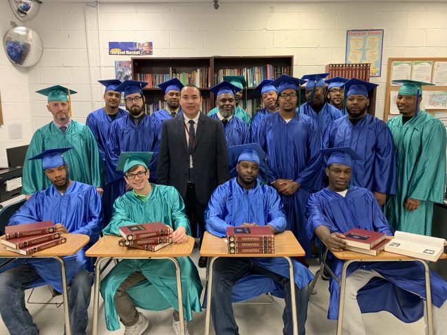 Harbor RRC Education Manager Fredy Yanes and the graduates