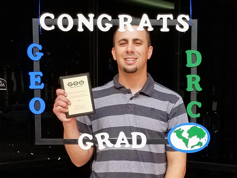 During COVID-19, drive-through transition ceremonies ensure graduating participants get credit