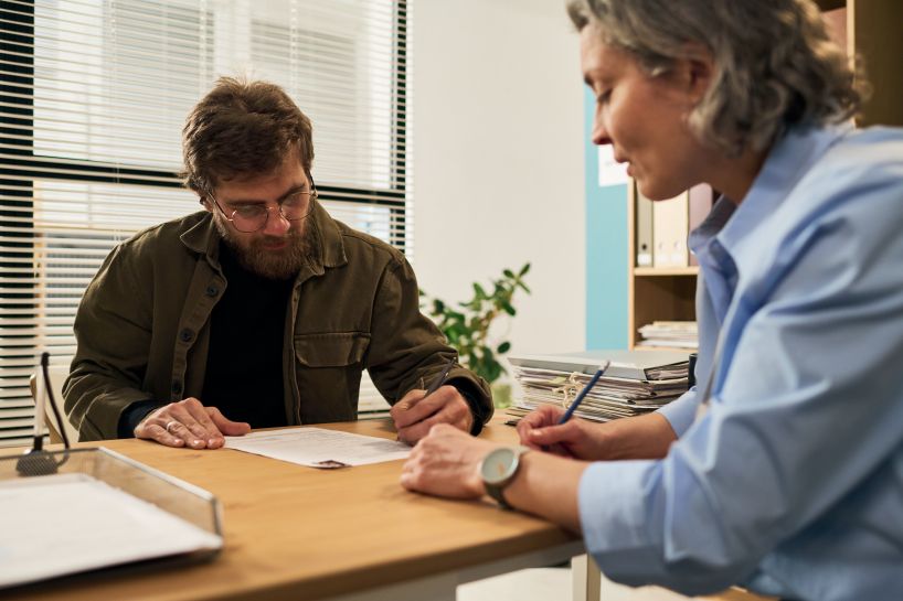 Probation Officer meeting with a participant in a reentry program